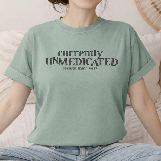 bay garment dyed currently unmedicated t shirt with results may vary text design