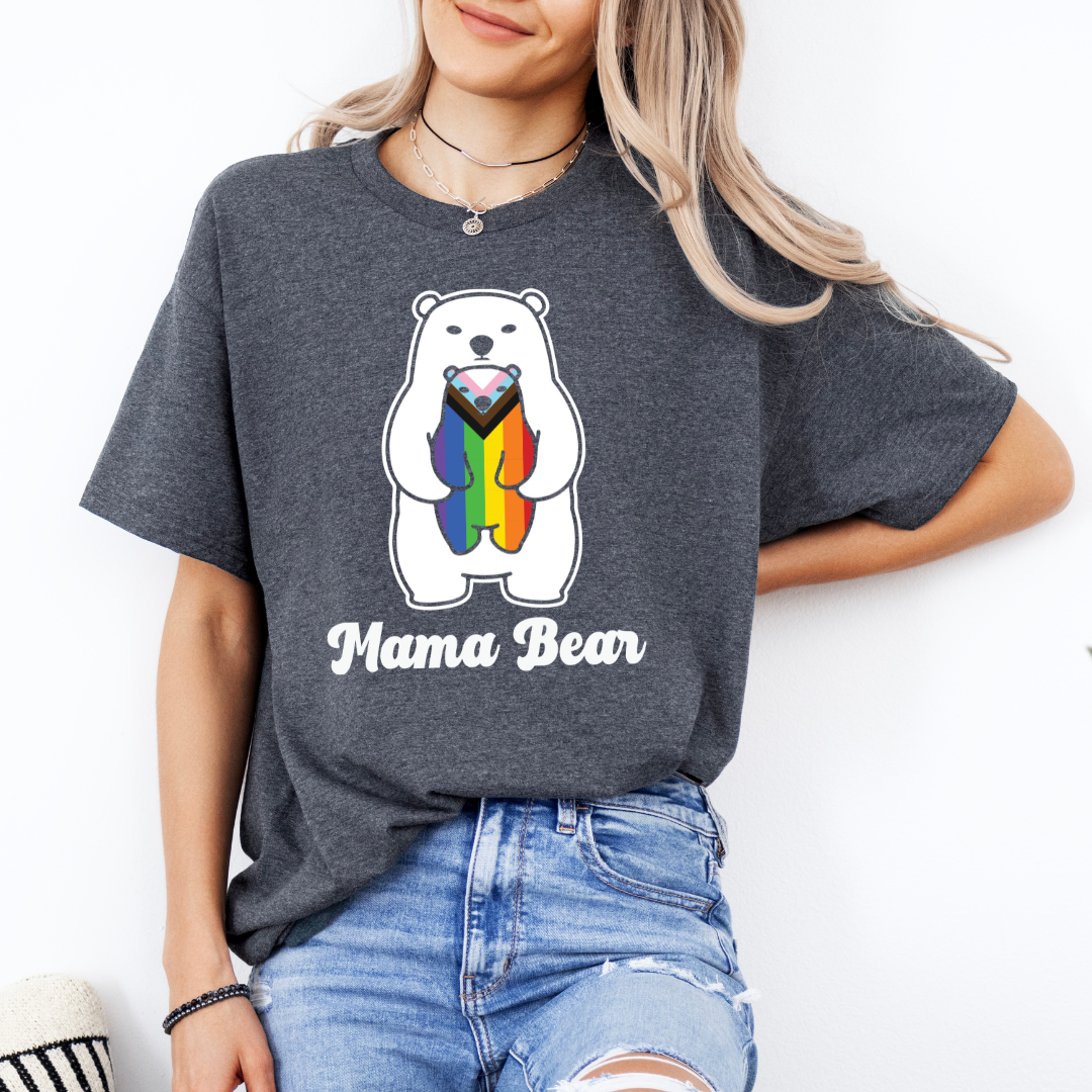 person wearing dark heather mama bear pride shirt with progressive flag bear design