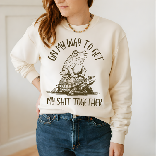 ivory garment dyed on my way to get my shit together lightweight crewneck with frog graphic design