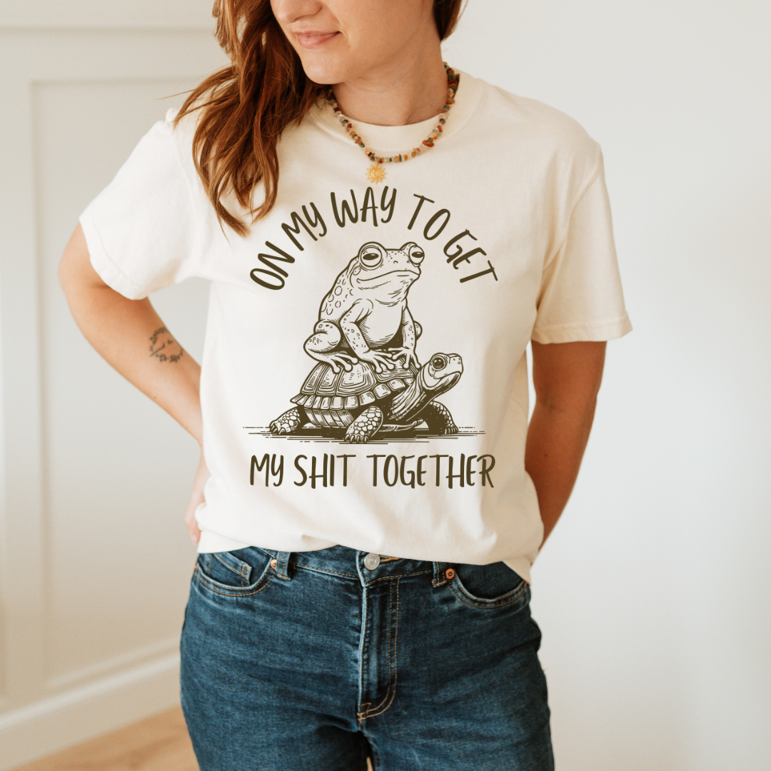 ivory garment dyed on my way to get my shit together t shirt with frog graphic design