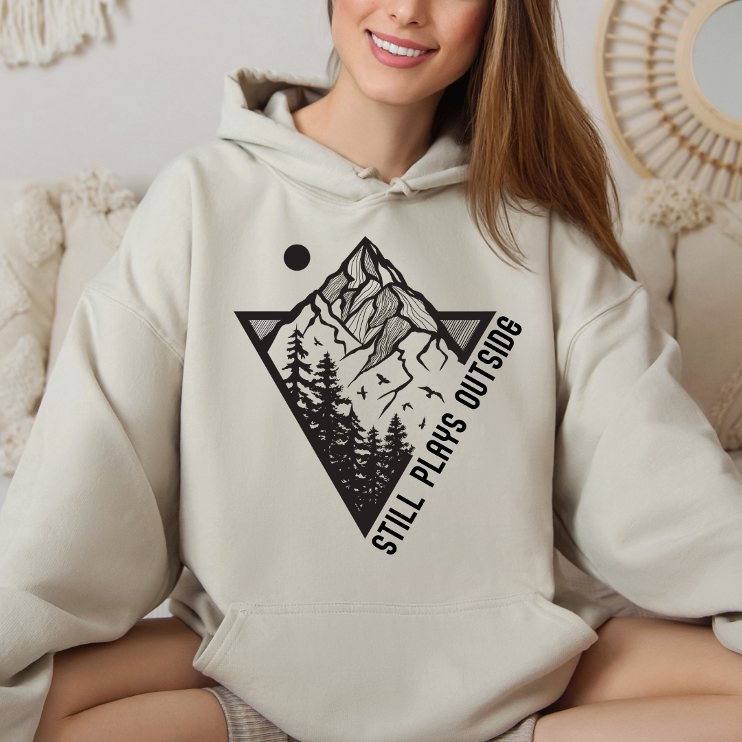sand still plays outside hoodie with mountain and forest graphic design