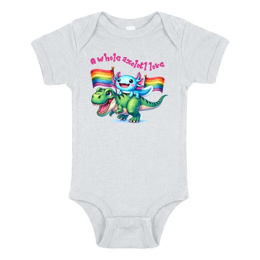 White baby bodysuit with cartoon axolotl riding a dinosaur, rainbow pride flags and “A Whole Axolotl Love” text