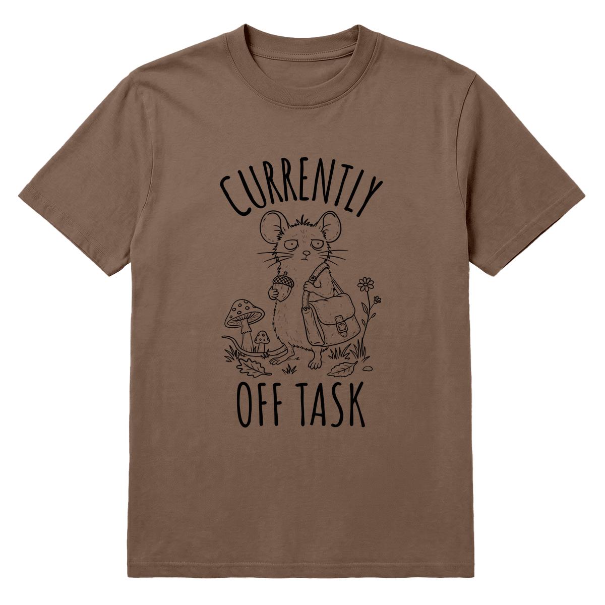 A brown short-sleeve crewneck t-shirt featuring a black line art graphic of a mouse holding an acorn and a small backpack, with the text 'CURRENTLY OFF TASK' printed around the illustration.