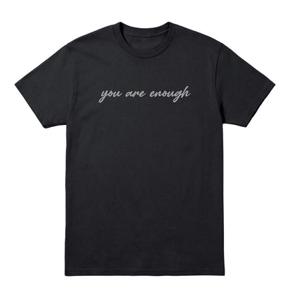 Black T-shirt with grey “You Are Enough” script across the front