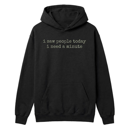 Black hoodie with “I Saw People Today I Need a Minute” text in muted sage green