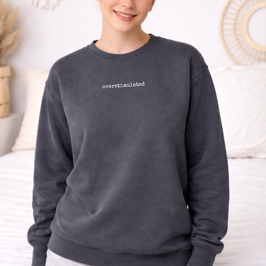 pepper garment dyed overstimulated crewneck with small minimalist text design