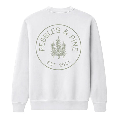 Back of white crewneck sweatshirt with large Pebbles & Pine Est. 2021 pine tree logo