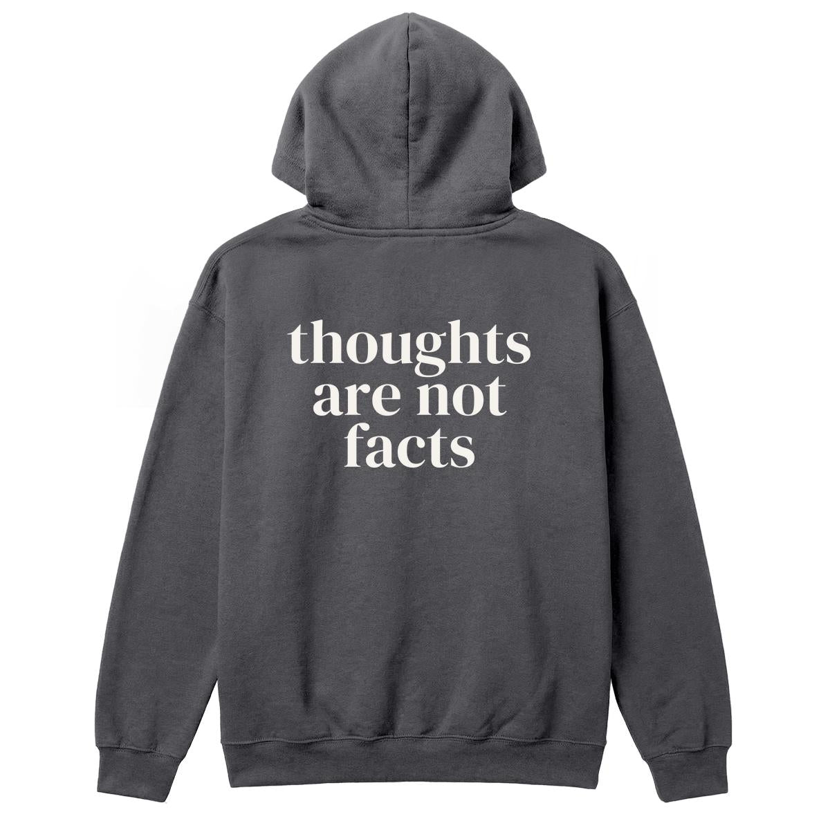 Back of charcoal hoodie with large “Thoughts Are Not Facts” text