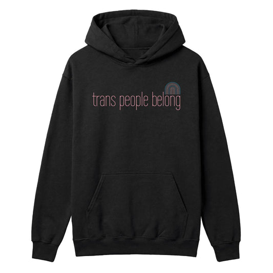 Black hoodie with pink “Trans People Belong” text and small trans pride rainbow graphic