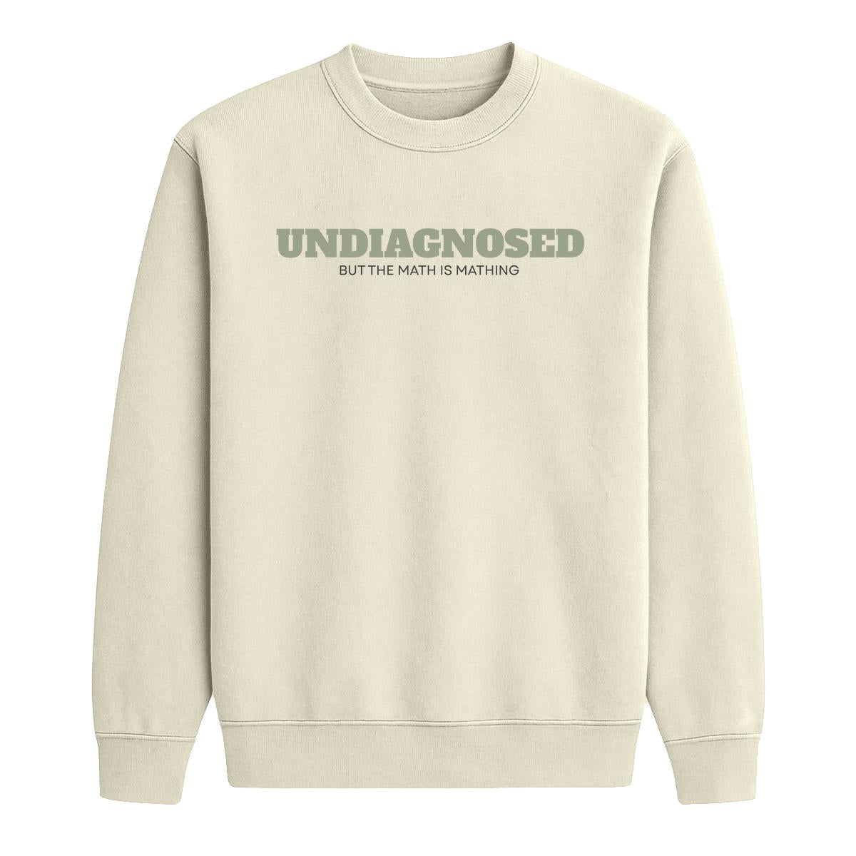 Sand crewneck sweatshirt with “Undiagnosed But the Math Is Mathing” text in sage green and black