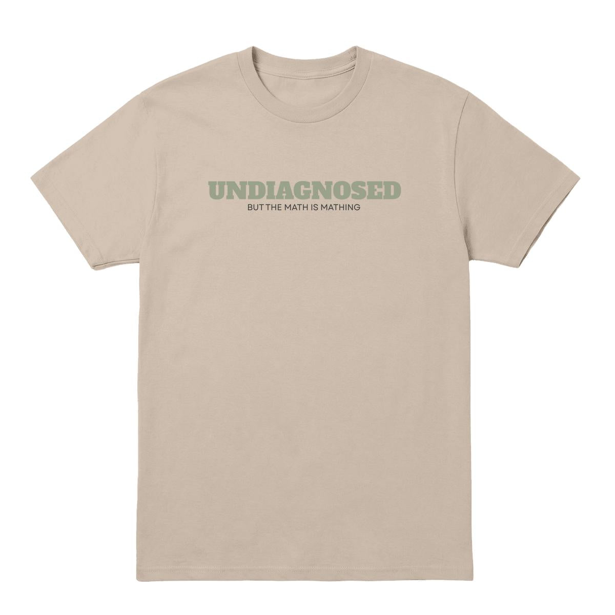 Sand T-shirt with “Undiagnosed But the Math Is Mathing” text in sage green and black