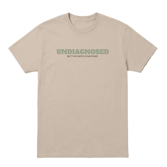 Sand T-shirt with “Undiagnosed But the Math Is Mathing” text in sage green and black