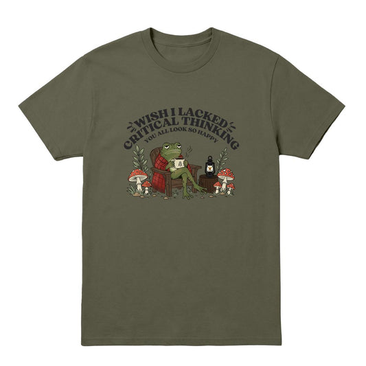 A military green short-sleeve crewneck t-shirt featuring a graphic print of a green frog sitting in a red plaid chair, surrounded by mushrooms, with the text 'WISH I LACKED CRITICAL THINKING SO ALL LOOK SO HAPPY' arched above it.